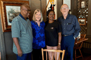 Inoussa Adjayi, and his lovely wife Rebecca having breakfast with Jay and Gale Scott Lockhart