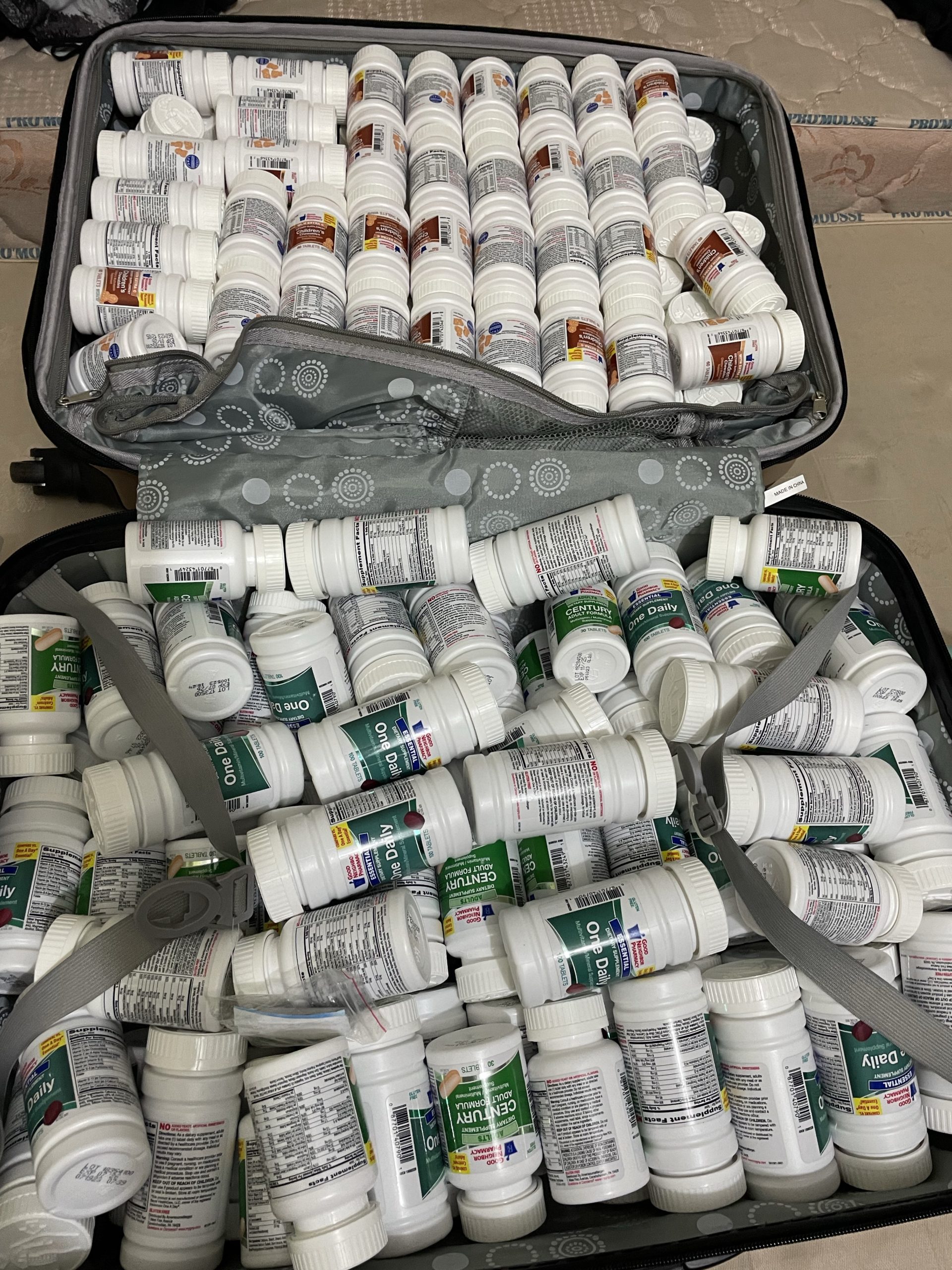 vitamins in suitcase
